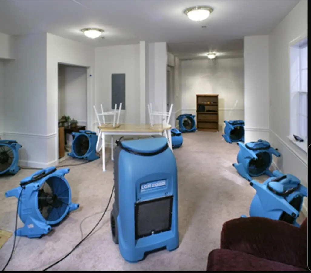 Air movers and dehumidifier setup for Water Damage Restoration in Port Salerno
